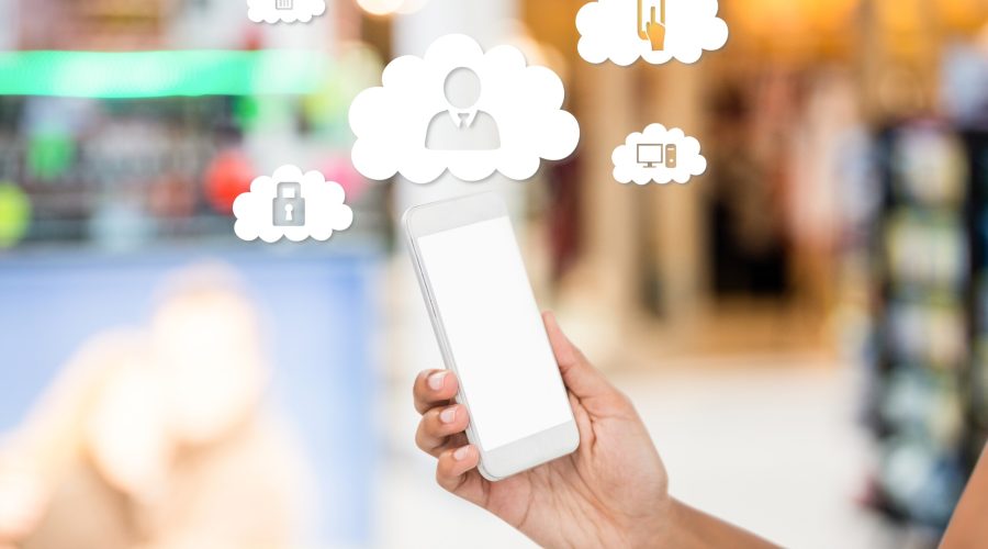digital composite of hand holding smartphone with vignettes